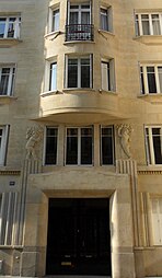 Art Deco reliefs of putti on Rue de Vaugirard no. 60, Paris, France, unknown architect, c. 1930