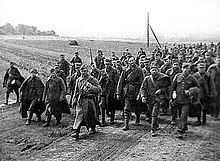 A photo of a crowd of marching Polish prisoners of war captured by the Red Army during the Soviet invasion of Poland