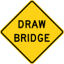 A diamond-shaped with yellow background and black border, with the words "Draw Bridge"
