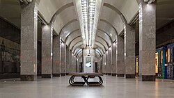 Modern metro station with square, tan pillars