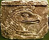 A bird-headed Apkallu on a relief at the palace of Ashurnasirpal II.