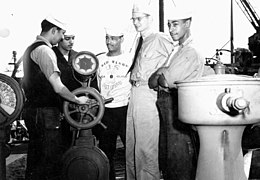 LT Carlton Skinner with several of his black crewmembers on Sea Cloud