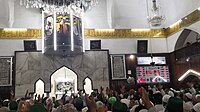 Manzoor Banday, head cleric of the Hazratbal Shrine, displaying the relic inside the mosque to the general public on the birthday of Abu Bakr in 2019