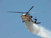 Los Angeles County Fire Department's Sikorsky S-70C Firehawk during a water drop demonstration at Station 129 in Lancaster, California