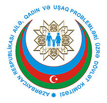 Committee logo, a man, woman and child inside a blue, red and green Islamic crescent