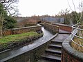 The Dunstall Water Bridge carries the Smestow Brook over the canal.