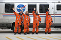 Crew alongside the Astrovan before heading to the launch pad