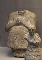 Statue of Iku-Shamash, King of Mari circa 2400 BCE (in the rear)