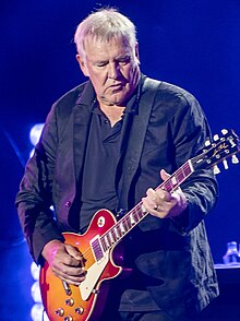 Lifeson performing in 2022
