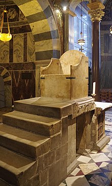 A photo of a marble throne
