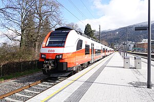 Above: Siemens Desiro trainset at Bregenz station in 2023; Below: Map of the network in Austria (A), Germany (D), Liechtenstein (FL) and Switzerland (CH)