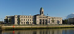 Photograph of the exterior of Cork City Hall in 2009 taken from across the River Lee