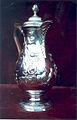 Silver hot water jug, Dublin c1770, using a coffee-pot shape with a higher base.