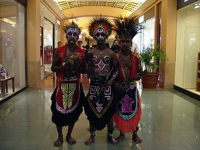 Papuan people in folk dress in Jakarta