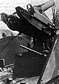 A closeup of the breech and mount of a 155 mm gun.