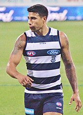 Male athlete in an Australian rules football game