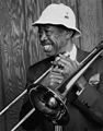 Image 10 Al Grey Photograph credit: William P. Gottlieb; restored by Adam Cuerden Al Grey (June 6, 1925 – March 24, 2000) was an American jazz trombonist who was known for his plunger-mute technique. After serving in World War II, he joined Benny Carter's band, then the bands of Jimmie Lunceford, Lucky Millinder, and Lionel Hampton. In the 1950s, he was a member of the big bands of Dizzy Gillespie and Count Basie before forming his own bands in the 1960s. This photograph by William P. Gottlieb shows Grey still performing into the 1980s. More selected portraits