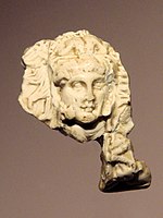 Alexander-Herakles head, Takht-i Sangin, Temple of the Oxus, 3rd century BCE.[25]
