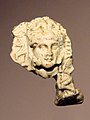 Alexander-Herakles head, Takht-i Sangin, Temple of the Oxus, 3rd century BCE.[43]