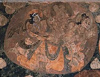 Paintings of celestial beings in the niche of the 55 meter large Buddha.