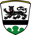 Gemeinde Pürgen In Silber ein gesenkter schwarzer Balken; oben schreitend ein rot bewehrter schwarzer Löwe, im Schildfuß ein grüner Dreiberg.