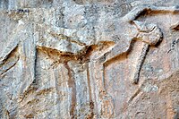Detail, a dead or dying Lullubian warrior. Darband-i Gawr rock-relief, Mt. Qaradagh, Sulaymaniyah, Iraq, 2200-2000 BCE