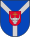 A coat of arms depicting a grey bull's head with a golden cross protruding from the top all on a red crest on a blue background