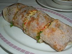 Popiah with vegetables and powdered peanuts as filling
