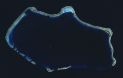 Bikini Atoll. Two craters from Operation Castle can be seen on the northwest cape of the atoll, adjacent to Namu island. The larger is from the 15 Mt Bravo shot, with the smaller 11 Mt Romeo crater adjoining it.