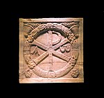 Monogramme of Christ (the Chi Rho) on a plaque of a sarcophagus, 4th-century AD, marble, Musei Vaticani, on display in a temporary exhibition at the Colosseum in Rome, Italy