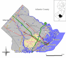 Location of Egg Harbor Township in Atlantic County highlighted in yellow (left). Inset map: Location of Atlantic County in New Jersey highlighted in black (right).