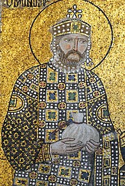Mosaic of a standing, crowned and bearded man dressed in gem-encrusted clothing and carrying a big bag of money