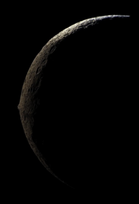 An image of Iapetus from its nightside that was photographed by an approaching Cassini, showing it as a slender crescent with its massive equatorial ridge clearly visible at the middle. This image was taken on September 10, 2007, at a distance of 83,000 kilometers (52,000 miles).[55]