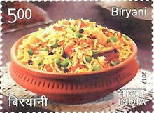 Decorative stamp with picture of a biryani served up in a round terracotta pot, labelled "500" in top left corner of stamp and "Biryani" in top right corner