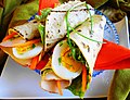 A Surinamese roti wrap with boiled egg and smoked chicken in the Netherlands