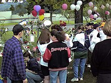 Students at memorial fence following shooting at Thurston HS in Springfield, Oregon in May 1998