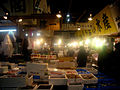 Vendors display the morning's catch at the market at 4:00 a.m.