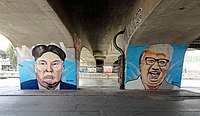 A mural with Kim Jong Un and Donald Trump in Vienna.