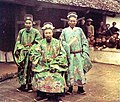 Nguyễn dynasty mandarins dressed in formal wear.