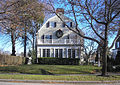 Dwelling with gambrel roof in Amityville, New York, made famous by The Amityville Horror.