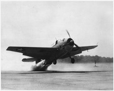 A Grumman TBF Avenger torpedo bomber taking off with the aid of 330 horsepower (250 kW) jet-assisted unit in about half the normal run.