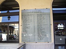 Large plaque with the names and ages of the victims