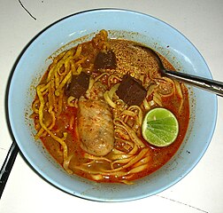 Chicken khao soi with curdled blood in a school cafeteria, Chiang Rai, Thailand.