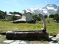 Image 29In the summers the cows are brought up to the high mountain meadows for grazing. Small summer villages such as the one shown in this photograph taken in Savoy are used. (from Alps)