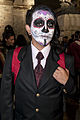 Man with sugar skull make-up photographed in Mexico City, celebrating Day of the Dead, 2014.