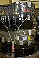 Labeled 100-gallon drums staged for downloading and emplacement in the repository