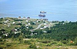 Portugal Cove, NL showing the two Bell Island ferries. Holy Rosary Church can be seen at the right of the picture.