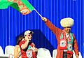 Turkmen football fan with a papakha (right)