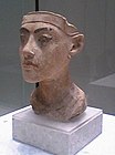 A plaster portrait of Tutankhamun, Akhenaten's successor, from the workshop of the sculptor Thutmose, on display at the Altes Museum