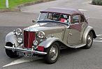MG TD circa 1953, with manual soft top and detachable side screens with plastic windows